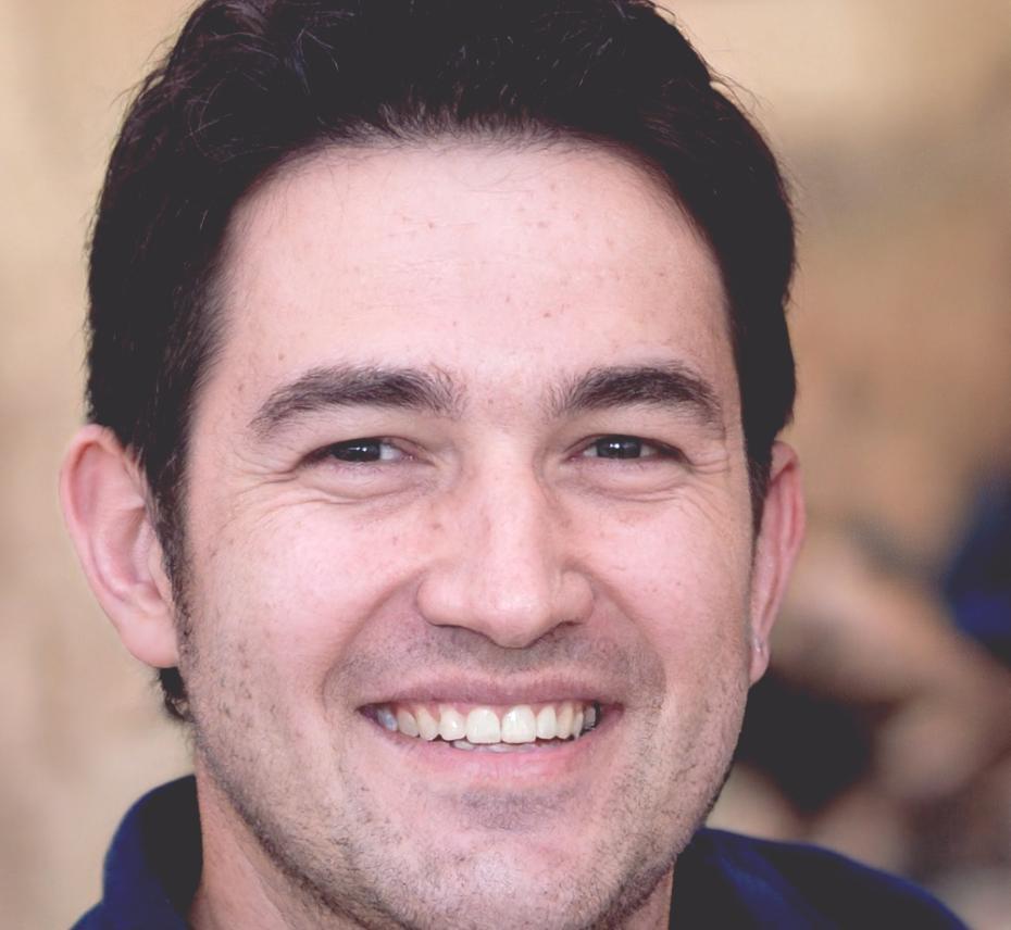 Lachlan Wetherspoon reviewing financial projections with business documentation